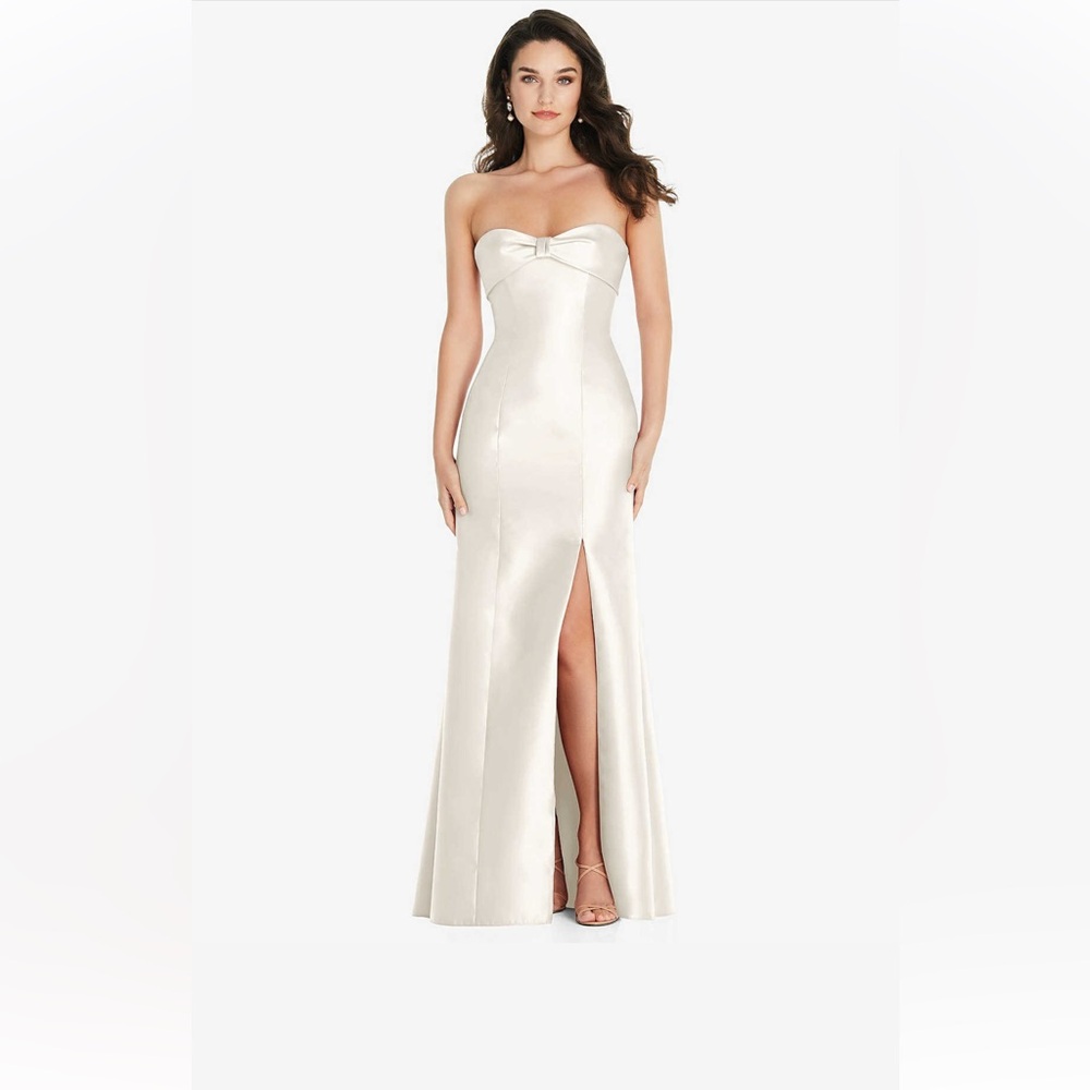 Dessy Group BOW CUFF STRAPLESS PRINCESS
WAIST TRUMPET GOWN IN
IVORY